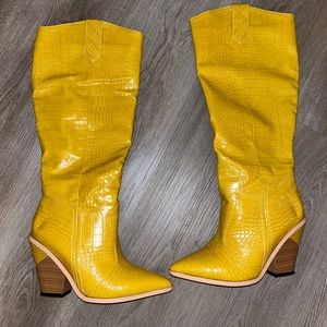 Yellow “crocodile” knee boots